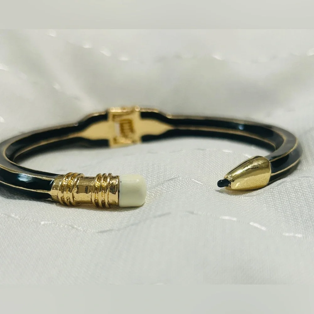 Plunder Pencil Shaped Elegant Black and Gold Open Cuff Bracelet. - Picture 3 of 6